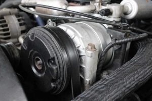 how to quiet a noisy car ac compressor